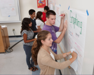 students at the whiteboard