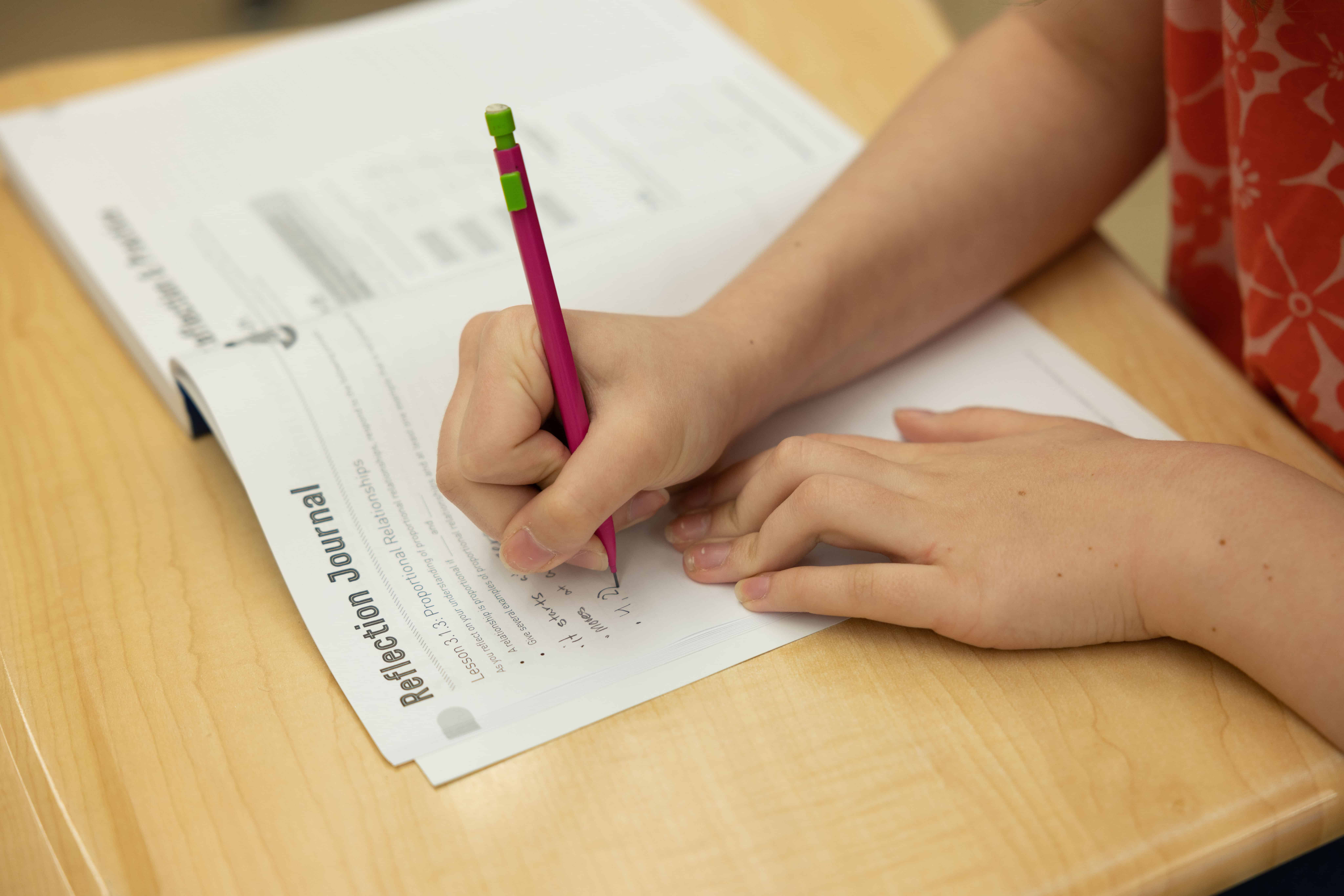 Students collaborating at desks
