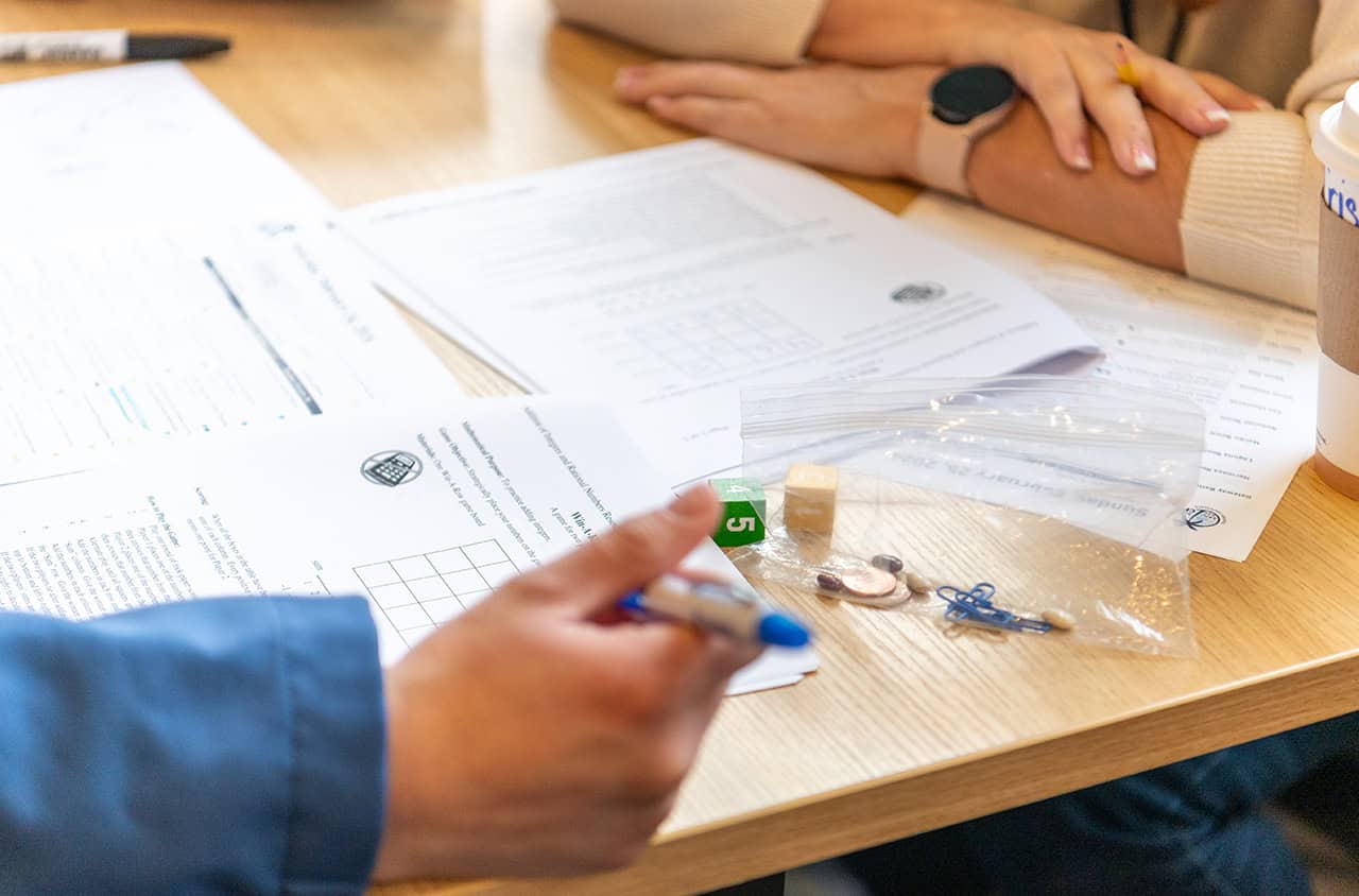 Teacher working with CPM materials