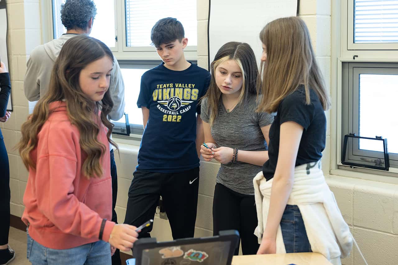 Tutor helping student with homework