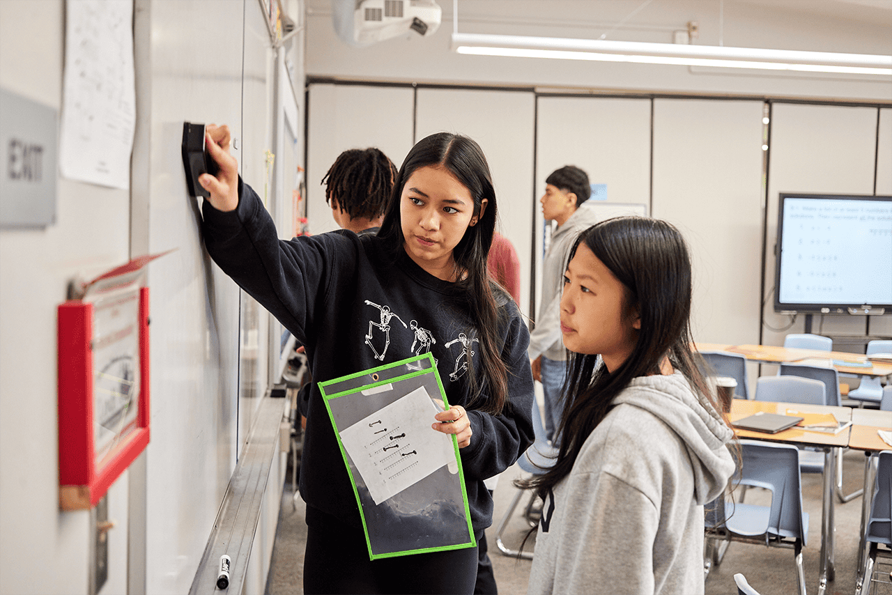 CPM students and teachers collaborating in a math classroom