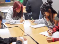 Students working together on math at their desks